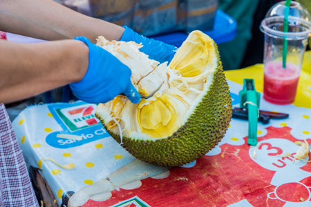 January 2019. Phuket Town Thailand. A View of durian being cut at the Sunday walking street market...