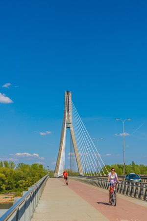 Warsaw Poland. April 2019. A view of the Swietokrzyski Bridge by the Vistula River in Warsaw in Polandのeditorial素材