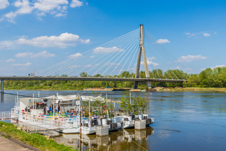 Warsaw Poland. April 2019. A view of the Swietokrzyski Bridge by the Vistula River in Warsaw in Polandのeditorial素材