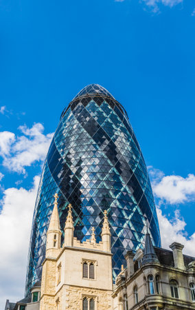 London. May 21 2019. The Gherkin building also known as re Insurance and St Andrew Undershaft Church, in the City of London in Londonのeditorial素材
