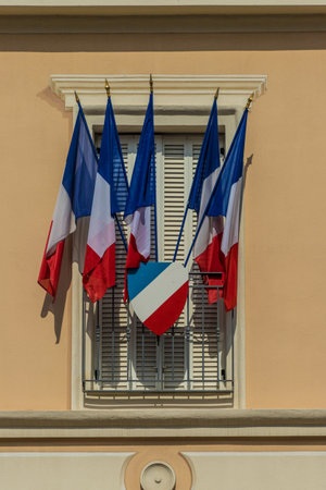 Beaulieu Sur Mer France. 18 June 2019. French flags outside the Municipal town hall building in Beaulieu sur Mer in Franceの写真素材
