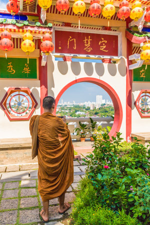 George Town malaysia. March 8 2019. A monk at Kek Lok si Temple in George Town Malaysiaのeditorial素材