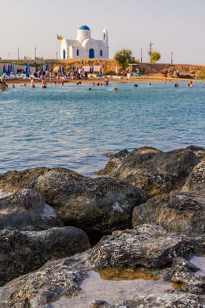 Paralimni Cyprus. 16 August 2019. A view of the mediterranean sean and agios nikolaos, st Nicholas church in paralimni in Cyprusのeditorial素材