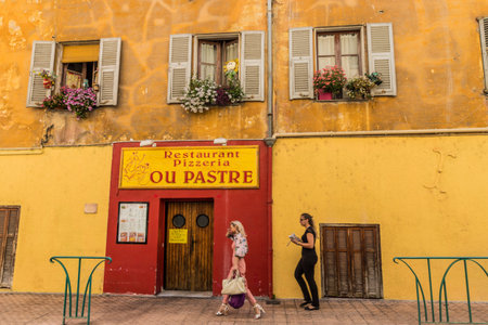 Menton France. 17 June 2019. A view colourful local shops of in Menton in Franceのeditorial素材