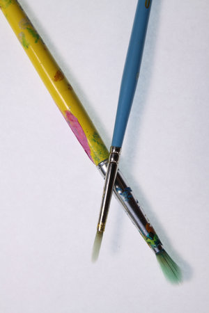  Pair of well used artists's paint brush,isolatedの写真素材