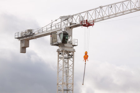 Close up of a building construction crane on a windy dayの写真素材