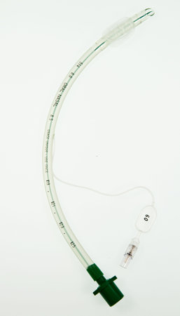 A cuffed endotracheal tube which is passed through the larynx into the windpipe, using a laryngoscope , during an anaesthetic to maintain an airway and supply oxygen and inhaled anaesthetic.の写真素材
