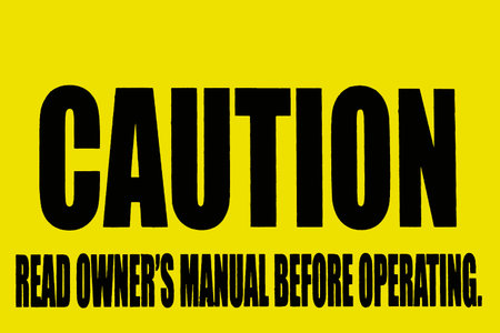 Caution Sign advising read owners manual before operating, black writing on yellow backgroundの写真素材