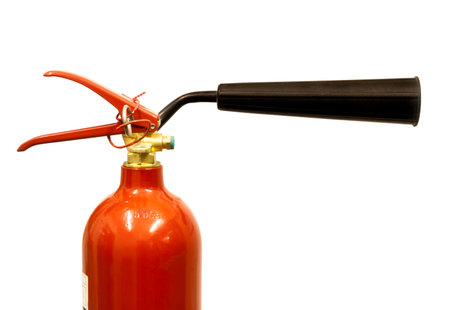 Close up of a carbon dioxide fire extinguisher on a white backgroundの写真素材