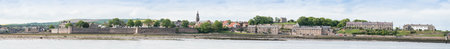 Panorama of Berwick upon Tweed viewed over the Tweed estuary with the seaward town wallsの写真素材