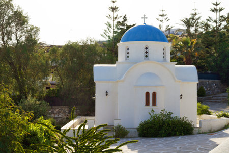 Typical church in Greece with blue cupolaの写真素材