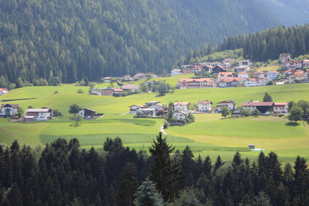 Valley in the Alps with small villageの写真素材