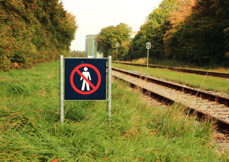 Sign prohibits access to a railway areaの写真素材