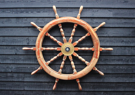 Old trawler steering wheel made of hardwoodの写真素材