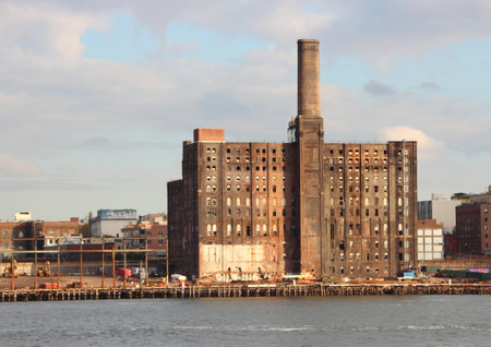 Abandon Old Factory in New York at Pier with East River in Foregroundの写真素材
