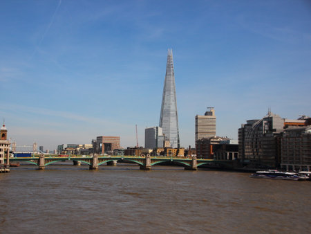 River Thames with The Shard Tower in Blue Sky Backgroundのeditorial素材