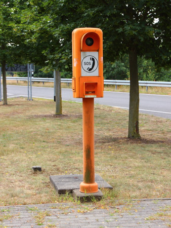 Orange European Highway Emergency Rescue Telephone Post Closeupの写真素材