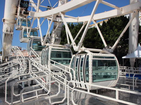Closeup Perspective on White Solid Ferris Wheel Cabinsの写真素材