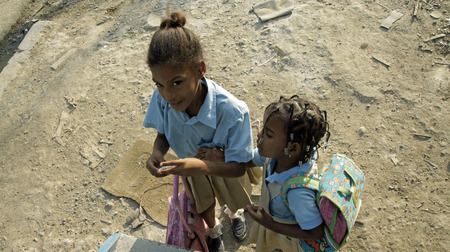 BOCA CHICA, DOMINICAN REPUBLIC,MARCH 2014: lucky caribbean children do not care about social problemsのeditorial素材