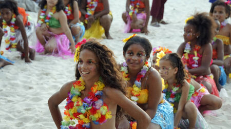 BOCA CHICA, DOMINICAN REPUBLIC, MARCH 2014: Resident people celebrate Caribbean Carnival on the Beachのeditorial素材