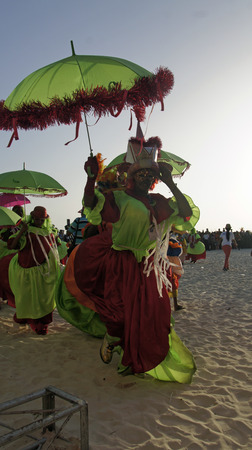 BOCA CHICA, DOMINICAN REPUBLIC, MARCH 2014: Resident people celebrate Caribbean Carnival on the Beachのeditorial素材