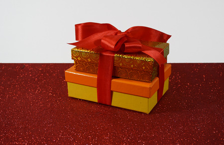 colorful xmas letters on red background for christmasの写真素材