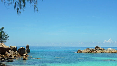 tropical bay with granite rocksの写真素材