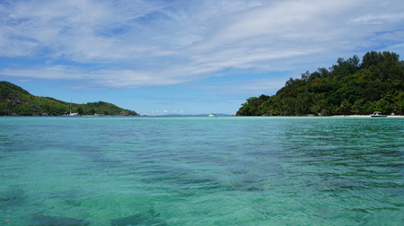 turquoise water of indian ocean on mahes coastの写真素材
