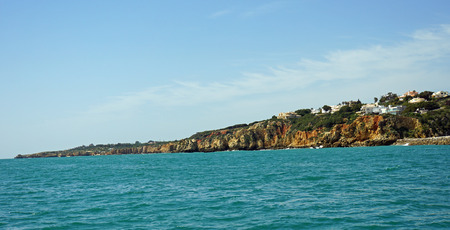 amazing algarve coastline taken from the seaの写真素材