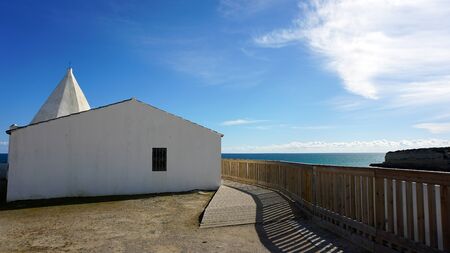 small chapel on senhora de la rocha praiaの写真素材