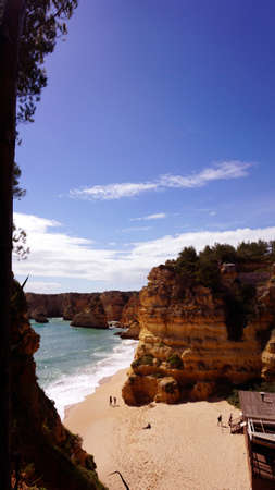 beach of playa de marinha in portugalの写真素材