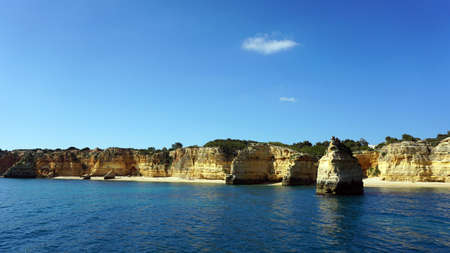 amazing algarve coastline taken from the seaの写真素材