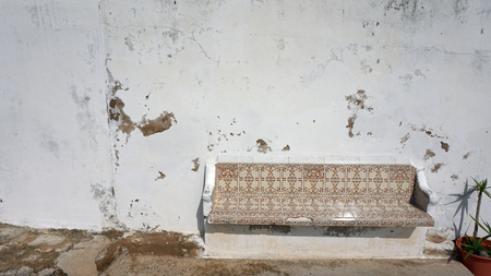 close up from seats build in a rotten wallの写真素材