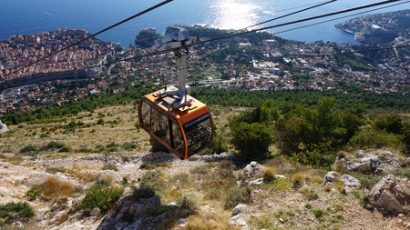 modern cable car running up a hill in dubrovnik in croatiaの写真素材