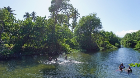 Rio Juan 2017, locals taking a bath in a riverのeditorial素材