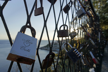 many padlocks on a bridge in dubrovnik in croatiaのeditorial素材