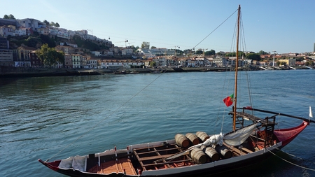 traditional colorful boats on douro river in porto