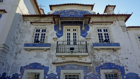 old and colorful train station of aveiro in portugalの写真素材