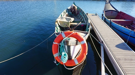 traditional fisher boats in the harbor of aveiro in portugal