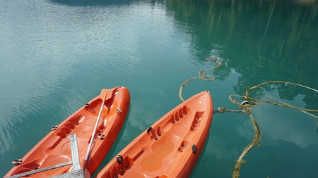 orange paddle boats in khao sok for kayaking