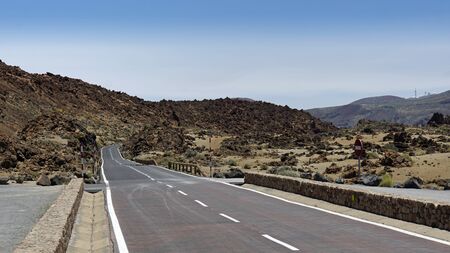 curvy serpentine roads on teide volcano on tenerife islandの写真素材