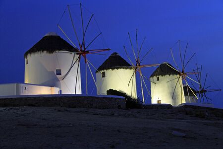 traditional greek windmills on mykonos island in greeceの写真素材