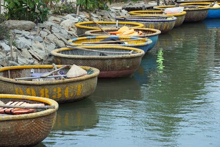 traditional round fisher basket boat from vietnamの写真素材