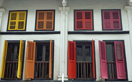 colorful old wooden window shutters in singaporeのeditorial素材