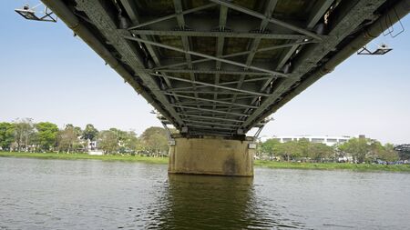 metal bridge over perfume river in hue