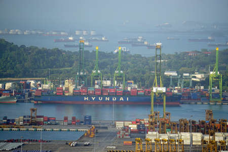 early morning in the huge harbor of singaporeのeditorial素材