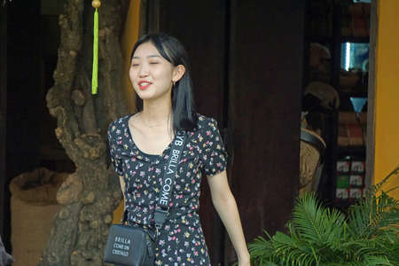 Hoi An Vietnam, circa February 2020: Tourist doing selfies