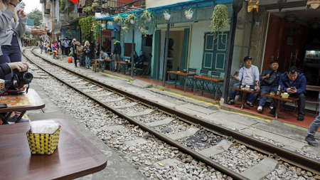 hanoi, vietnam, circa january 2020: tourists visiting famous train streetのeditorial素材