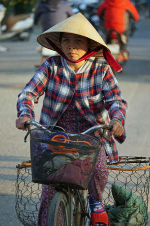 hanoi, vietnam, circa january, 2020: bike traffic in the streetsのeditorial素材