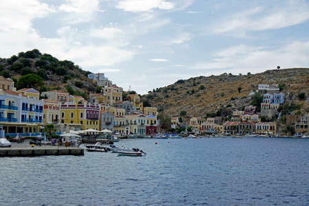 symi, greece, circa August 2021 - small village at harbor